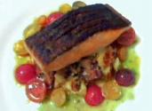 Seared Crisp Skin Wild Salmon On A Potato And Chanterelle Mushroom Hash With A Tomato Citronette 